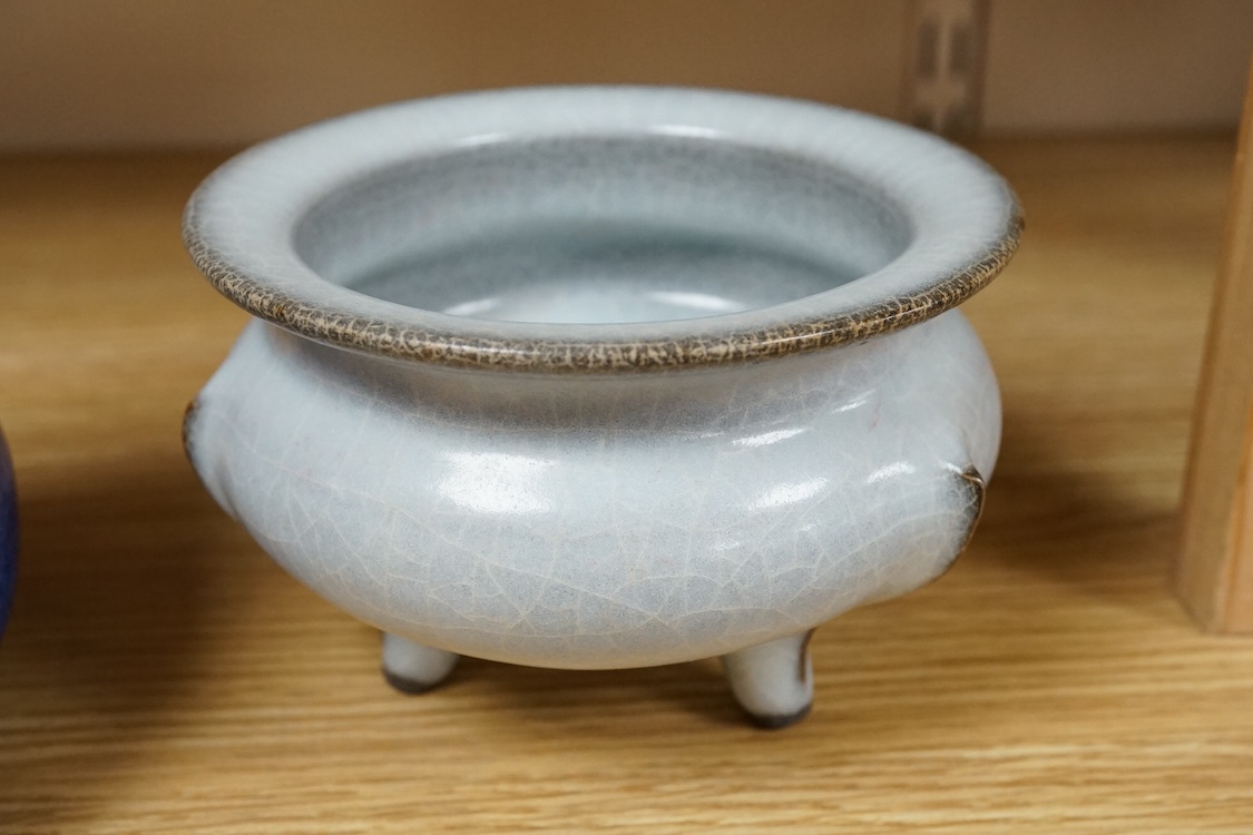 A Chinese crackle glaze tripod censer and powder blue jug, 14cm